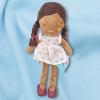 SOS doudou poupée  OKAÏDI OBAÏBI peluche robe rose motifs fleurs cheveux brun avec 2 tresses