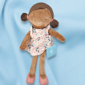 SOS doudou poupée  OKAÏDI OBAÏBI peluche robe rose motifs fleurs cheveux brun avec 2 chignons