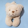 Ours TEX CARREFOUR doudou beige allongé
