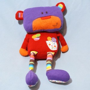 Ours FNAC Eveil & jeux doudou rouge violet