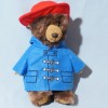 Ours PADDINGTON peluche manteau bleu chapeau rouge