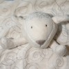 Mouton OBAIBI doudou carré plat beige, spirales marron