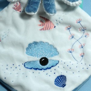 Pieuvre TEX peluche bleue et doudou blanc